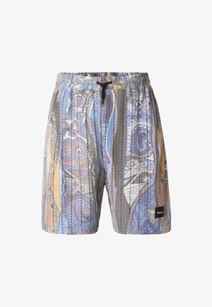 Herre multifarvede strikkede shorts med abstrakte mønstre, elastik i taljen, sort snøre og lille sort mærke på højre ben.
