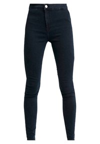 Tighta jeans i mörk denim med hög midja, framdragkedja och knappstängning. Slät textur med minimal sömnad och utan synliga mönster.