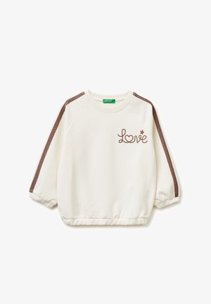 Sweat-shirt crème à manches longues avec des rayures marron sur les manches et « Love » brodé avec un cœur et une étoile sur la poitrine.