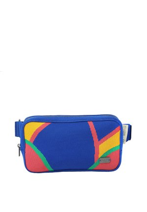 Ristkülikukujuline sinine kangast vöökott kollaste, punaste ja roheliste kõverate aktsentidega, lukuga ja reguleeritava rihmaga külgmise pandlaga.