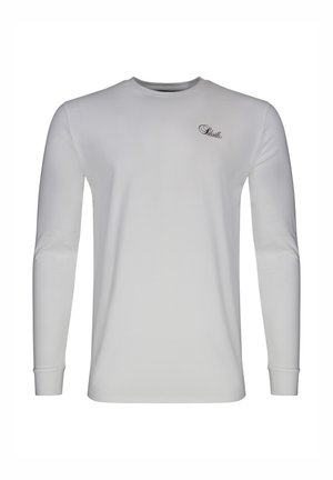 Tricou alb cu mâneci lungi și gât rotund, cu un mic logo text negru, scris de mână, în partea superioară stângă a pieptului.