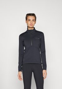 Haut à manches longues noir avec fermeture éclair mi-haute, fabriqué en tissu léger et extensible. Présente un col montant, une silhouette ajustée et un logo subtil sur la poitrine.