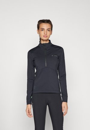 Black long-sleeve half-zip top made of lightweight, stretchy fabric. Features a high collar, fitted silhouette, and subtle logo on the chest.