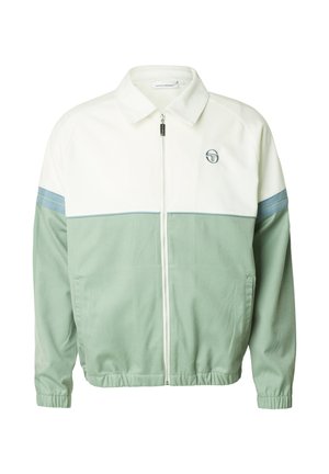 Giacca con zip bianca e verde salvia, collo, polsini ed orlo elasticizzati, logo sul petto a sinistra e dettagli a strisce blu sulle maniche.