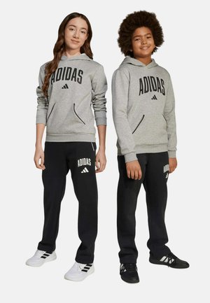 adidas Performance, PANTALONES DE DEPORTE ESSENTIALS UNISEX - Pantalon de survêtement - black