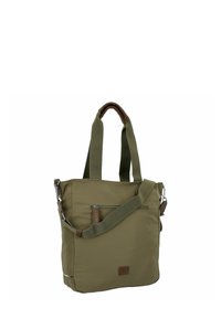 Olivengrøn tote bag med stofoverflade, dobbelte håndtag og justerbar skulderrem. Den har en frontlomme med lynlås og teksturerede trimdetaljer.