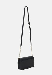 kate spade new york KNOTT PEBBLED FLAP CROSSBODY - Cross body bag - black