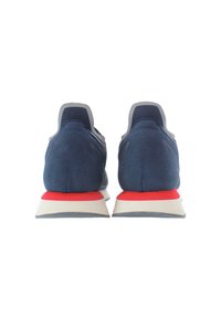 Navy blue athletic shoes with a smooth texture, featuring red accents on the heel and a white sole. Designed for comfort and performance.