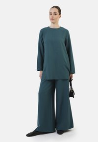 Modanisa Stoffhose - blue