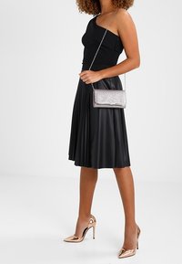 Tamaris Kuvertväska - pink