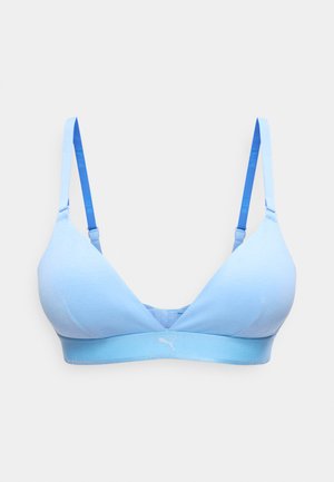 Ανοιχτό μπλε ενισχυμένο σουτιέν με ρυθμιζόμενους ιμάντες και ελαστική ταινία στο κάτω μέρος με το λογότυπο της Puma σε λευκό φόντο.