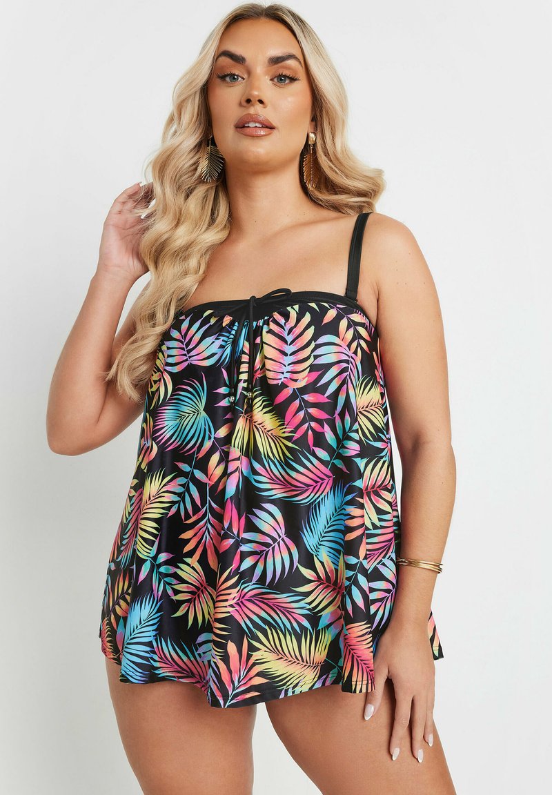 Top da bagno con motivo di foglie tropicali multicolori su sfondo nero, spalline regolabili e dettaglio anteriore con coulisse.