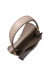 Leather handbag in neutral tones, featuring a structured design, rounded handle, and gold-tone hardware. Interior has zip and slip pockets.