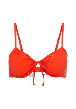 Red bikini top with ruched fabric, adjustable straps, and a front tie detail. Smooth texture, triangular cups, and minimalistic design.