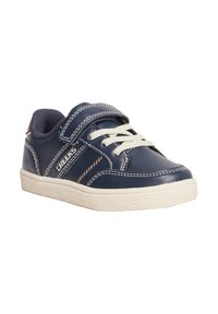 Marineblaue synthetische Sneaker mit weißer Ziernaht und einem Klettverschluss. Sie verfügen über eine strukturierte Gummisohle und cremefarbene Akzente. Marke: Creeks.