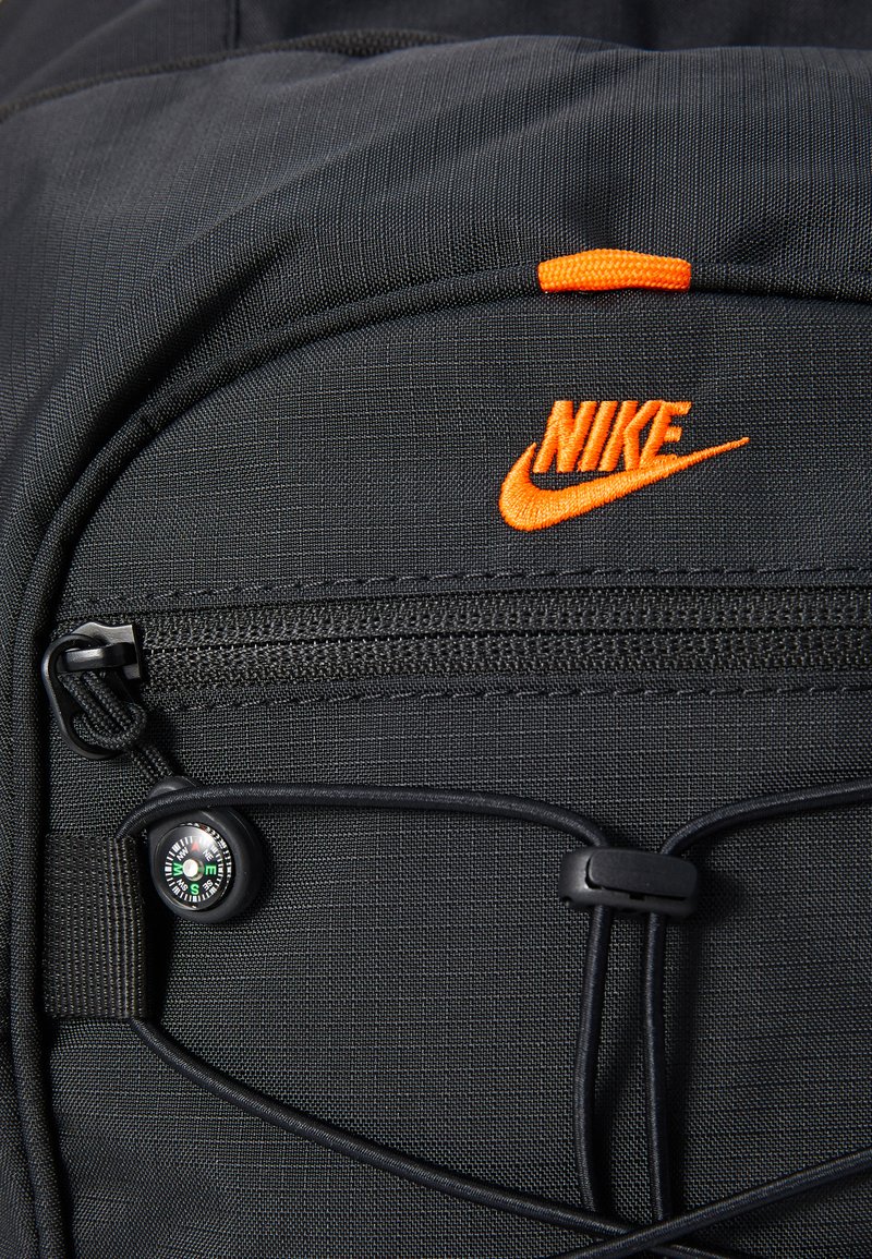 black and orange nike backpack 3 Brand Graphic Print Black/Red One Size (30L) Discover a new dimension in the world of basketball Nike Hike Backpack DJ9677-819 Orange