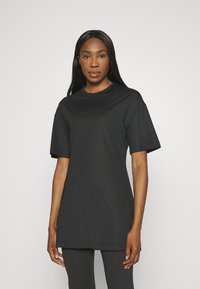 Puma - ACTIVEWEAR OVERSIZED TEE - Sports T-shirts - black Miniaturebillede 1