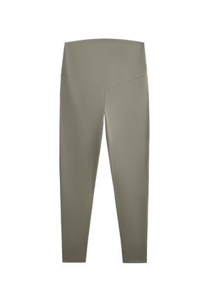 Höga leggings i en dämpad olivgrön tyg, med en slät textur och en åtsittande silhuett utan synliga sömmar eller mönster.
