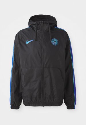 Black full-zip hooded jacket with blue Nike logo and round blue emblem, blue and turquoise stripes on sleeves, elastic cuffs, and front pockets.