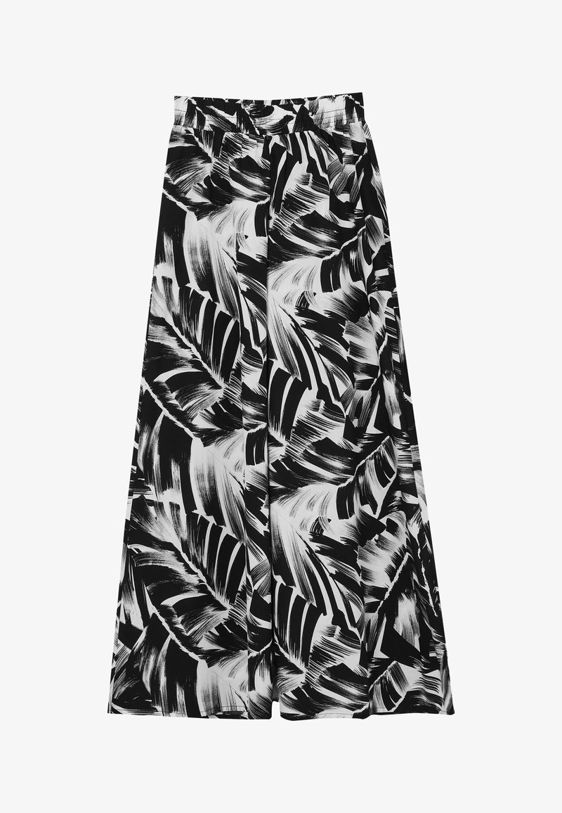 Pantalon noir et blanc à jambes larges avec un motif de feuilles abstraites audacieux et une taille élastique, posé à plat sur un fond blanc.