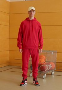 Jordan Kapuzenpullover - gym red/black