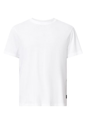 Hvid bomulds T-shirt med rund hals, korte ærmer, afslappet pasform og et lille mærke på den nederste side. Ingen mønstre eller grafik.