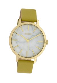 Gold-tone watch with a marble-patterned white dial, yellow markers, and a green leather strap. Round case and minimalist design.