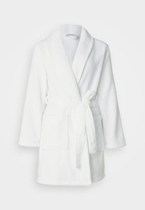 White fleece bathrobe with long sleeves, shawl collar, wrap design, tie belt, and two front pockets. Soft texture and uniform appearance.