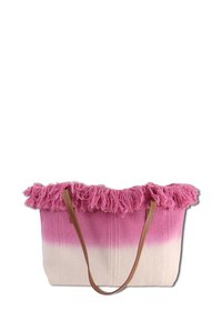 Sac fourre-tout tissé présentant un dégradé de rose et de blanc, avec un bord supérieur frangé rose et des anses en cuir marron.