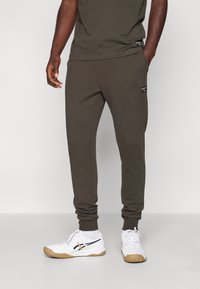 Björn Borg CENTRE TAPERED PANTS - Donji dijelovi trenirke - peat