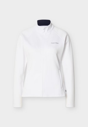 Άσπρο μπουφάν Calvin Klein με πλήρες φερμουάρ, γιακά που στέκεται, μακριά μανίκια, πλαϊνές τσέπες και διακριτικό λογότυπο στο αριστερό μέρος του στήθους.