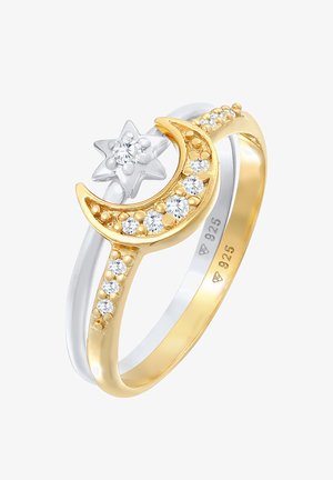 Auksinis ir sidabrinis žiedas su pjūvio mėnulio ir žvaigždės raštu, puoštu skaidriais brangakmeniais žiedo juostoje ir tekstūriniais akcentais.