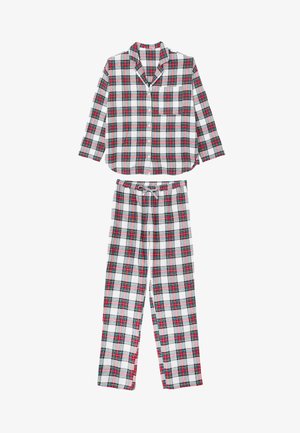 Ensemble de pyjama en coton à carreaux comprenant une chemise boutonnée avec une poche poitrine et un pantalon avec cordon de serrage. Les couleurs incluent rouge, vert et blanc.