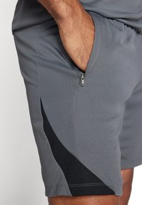 Nike Performance STRIKE SHORT - Sports shorts - iron grey/black/sunset pulse