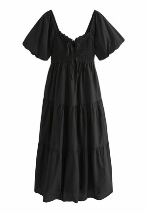Black midi dress with puff sleeves, smocked bodice, tie detail at neckline, and tiered skirt.