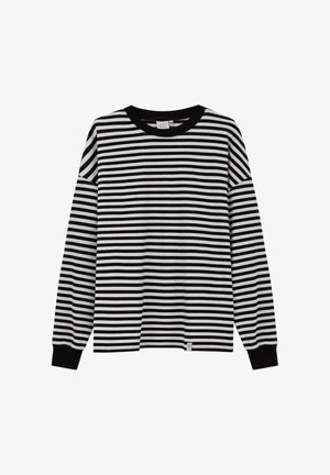 Czarnobiała koszulka w paski z długim rękawem, dekoltem typu crew i czarnymi mankietami. Wykonana z miękkiego materiału. Metka widoczna na dole po lewej stronie.