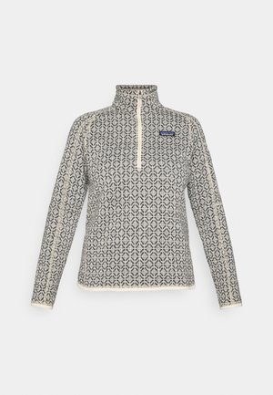 Fleece puloveris ar ceturtdaļas rāvējslēdzēju, ar ģeometrisku rakstu melnā un krēmkrāsā, kontrastējošiem rāvējslēdzēja un apkakles akcentiem, strukturētu audumu.