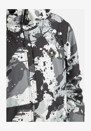 Schwarze, weiße und graue Jacke mit Klecksmuster,Frontreißverschluss, verstellbarem Kapuze und einem rautenförmigen Logo auf der Brust.