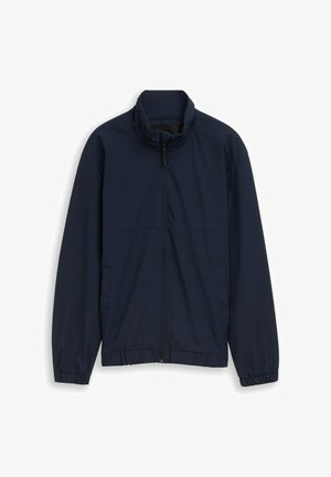 Giacca leggera blu navy con cerniera frontale completa, polsini elasticizzati, collo alto e due tasche laterali.