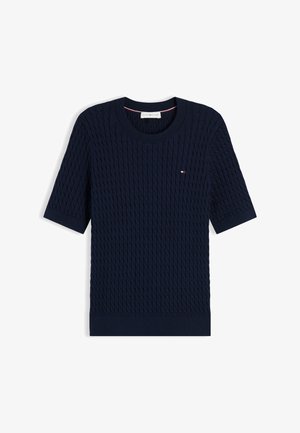 Tumesinine lühikeste varrukatega kaablikootud kampsun ümarate kaelusega ja väikese Tommy Hilfigeri logoga vasakul rinnal.