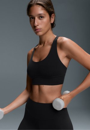 OYSHO, COMFORTLUX MEDIUM SUPPORT WITH CUPS - Brassières de sport à maintien normal - black