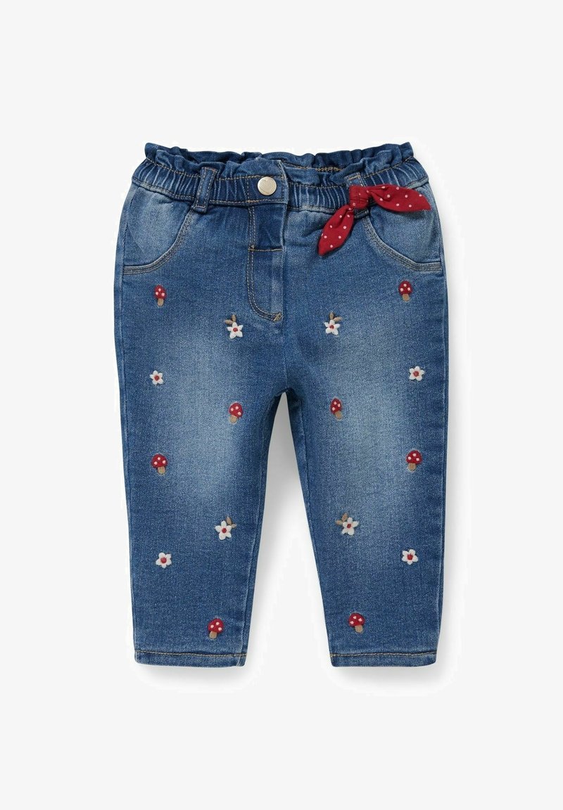 Jean bleu pour tout-petit avec taille élastique, bouton frontal, nœud rouge à pois, décoré de champignons rouges brodés et de fleurs blanches.