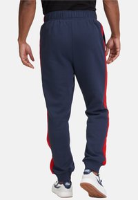 Fila Trainingsbroek - black iris true red