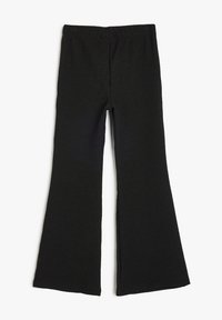 Sorte ribbede flared bukser med elastisk talje, der har en tekstureret overflade og en bred ben-design.