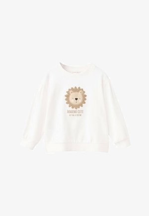 Bílá bavlněná mikina s dlouhými rukávy, zdobená grafickým motivem hnědého lva a textem "ROZKOŠNÝ, ALE JEN PŘI SPANÍ" pod ním.