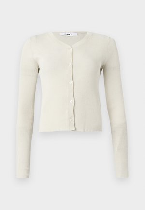 Svetlo bež rebrasti pleteni kardigan z dolgimi rokavi, V-izrezom in gumbom za zapiranje spredaj. Mehak material in skrajšana dolžina.