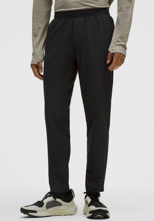 Pantalones deportivos - black