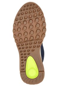 ECCO Schuhsohle mit braunem Gummiuntergrund, runden Profilen, einem grünen Akzent near der Ferse und einem strukturierten Muster für besseren Halt.