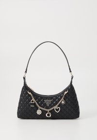 Black quilted handbag with a curved handle, featuring gold-tone hardware and decorative charms, including letters and floral designs.