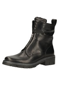 Bottine en cuir noir avec fermeture éclair sur le côté, tige texturée, col rembourré et semelle en caoutchouc épaisse. Présente un léger talon.